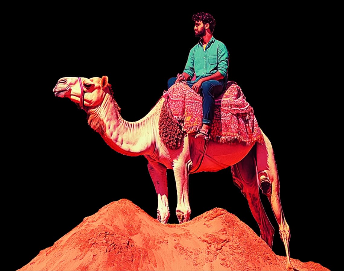 A man riding a camel